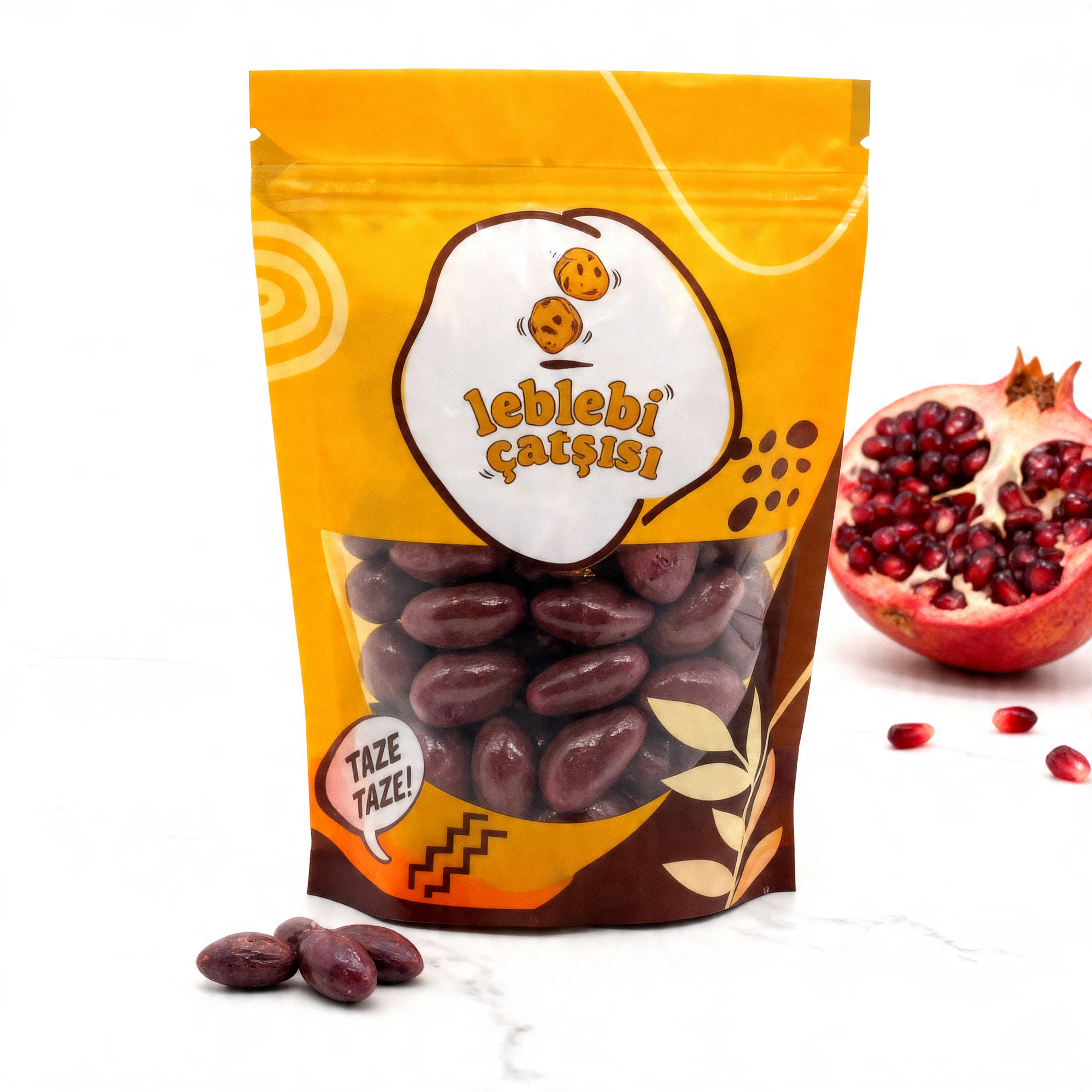Nar aromalı beyaz çikolata ile kaplanmış pütürlü yüzeyli badem drajeler