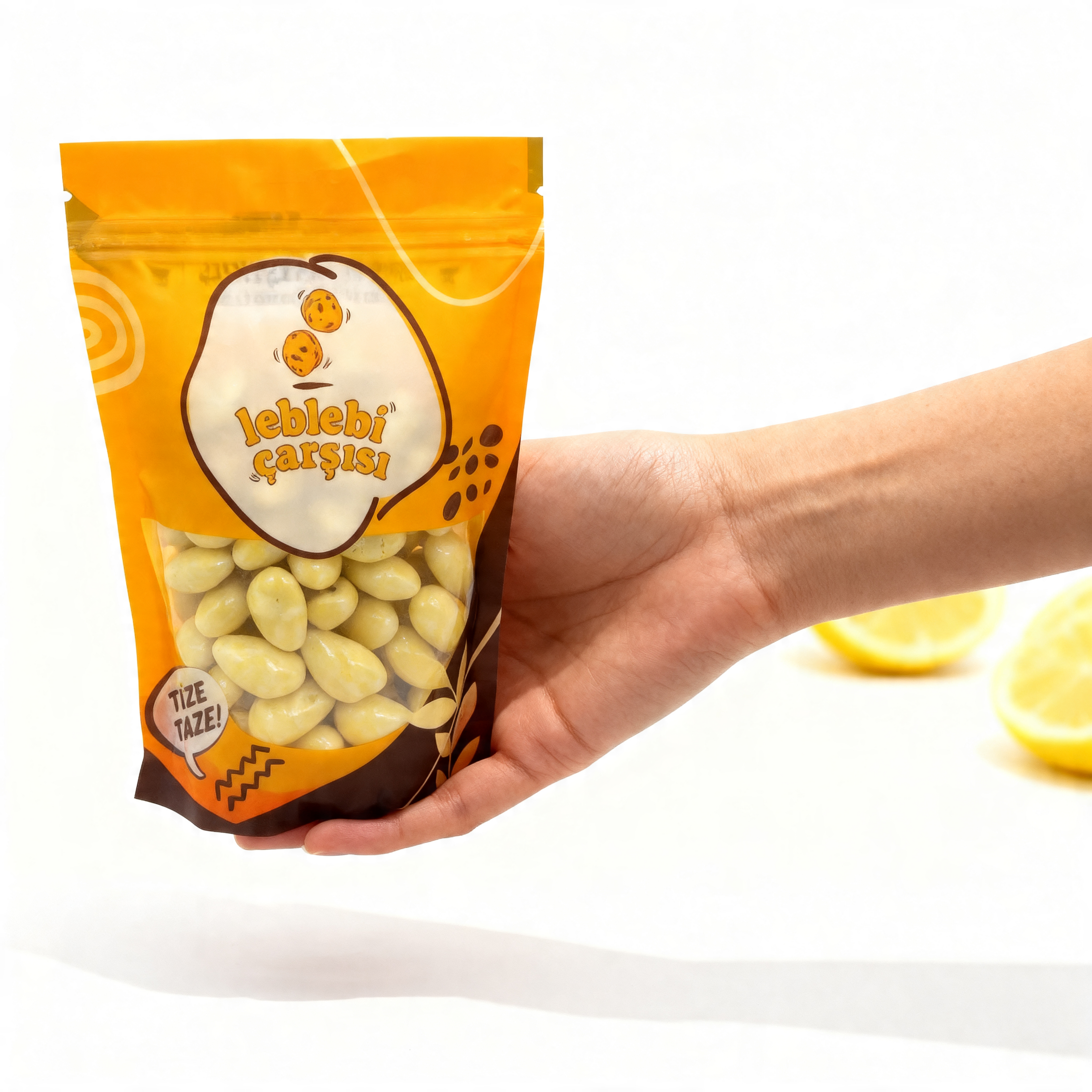 Limon aromalı beyaz çikolata ile kaplanmış çıtır badem drajeler