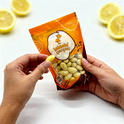 Limon aromalı beyaz çikolata ile kaplanmış çıtır badem drajeler