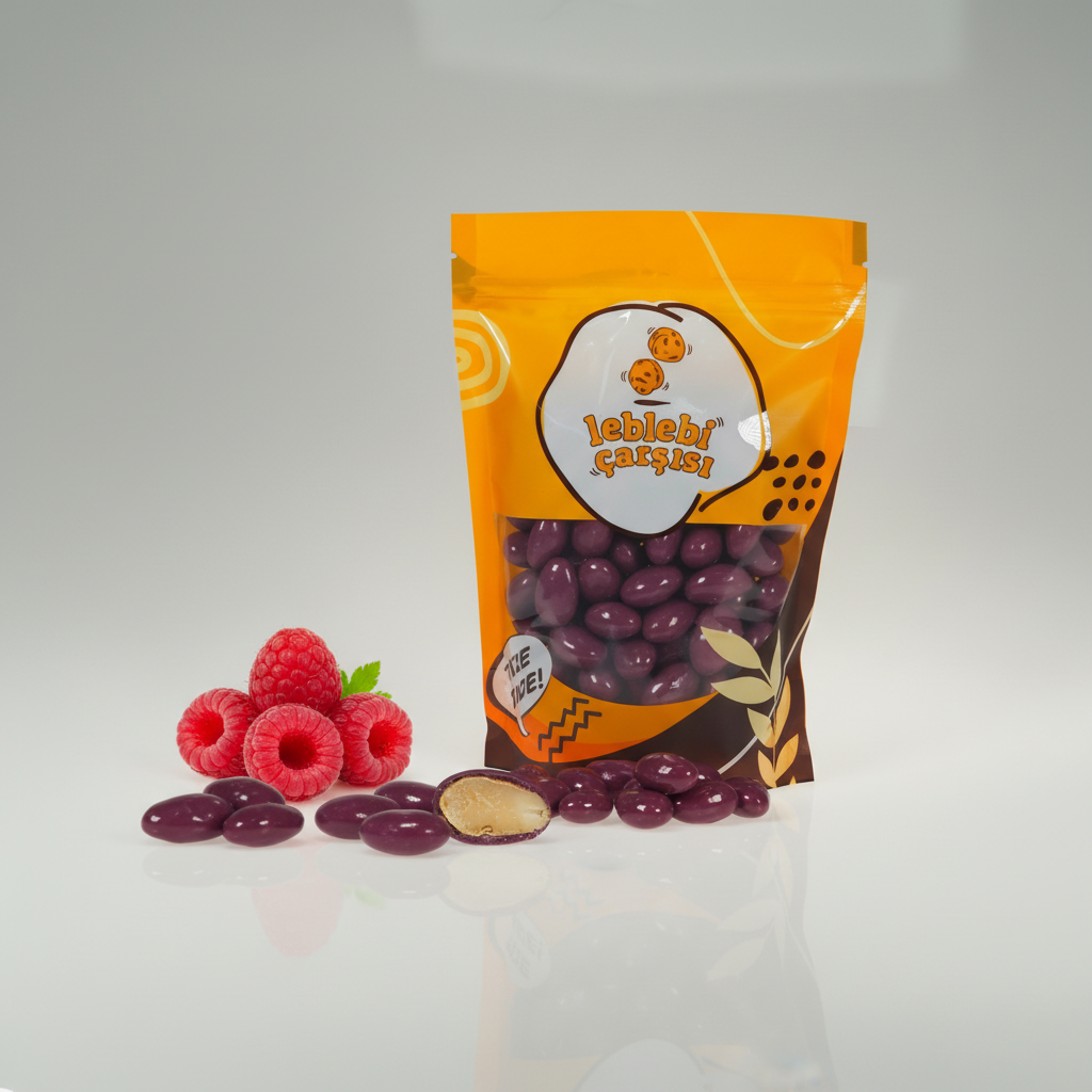 Ahududu aromalı sütlü çikolata kaplı badem drajeler – pembe tonlu meyvemsi atıştırmalık